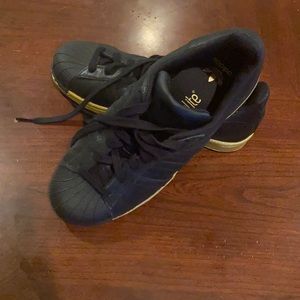 Black and cold adidas superstar